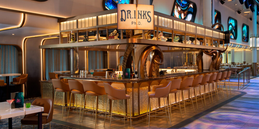 Front view of DR INK Ph.D. bar on Carnival Jubilee, featuring underwater-themed decor with octopus design details.